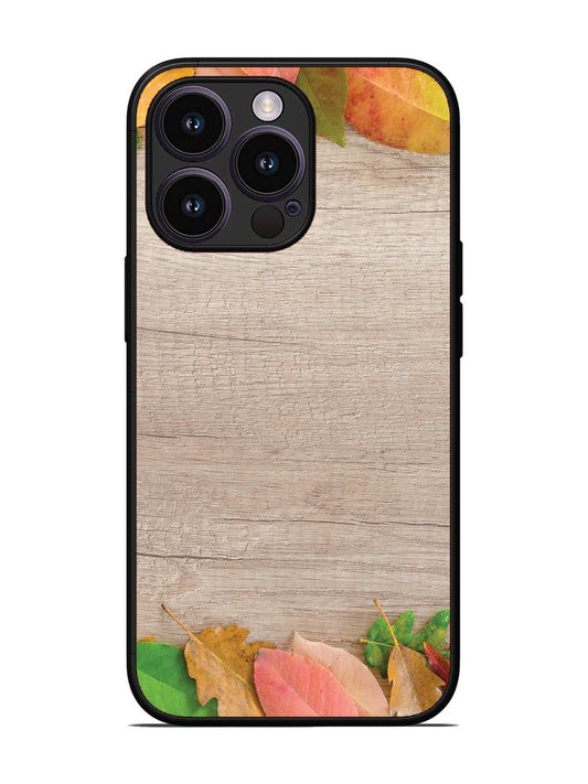 iPhone 14 Pro Autumn Leafs On Wooden Table