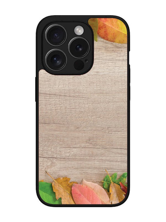 iPhone 15 Pro Autumn Leafs On Wooden Table