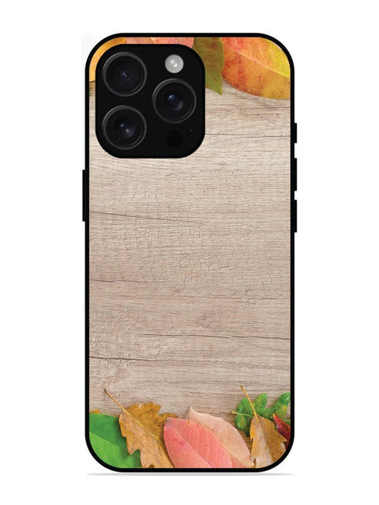 iPhone 16 Pro Max Autumn Leafs On Wooden Table